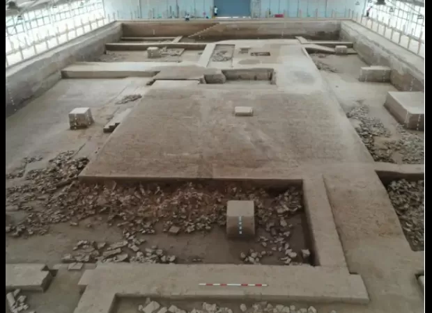 An ancient Chinese palace has been unearthed with a 2,400-year-old flushable toilet. The palace had been buried under soil and vegetation for centuries before being discovered by construction workers. The toilet is the first of its kind to be found in Chi