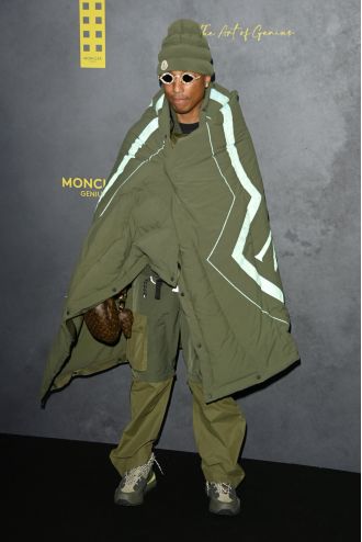Pharrell Williams was seen wearing a sleeping bag-like outfit at a London Fashion Week event, shortly after being chosen to work with Louis Vuitton.