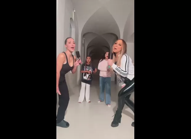 Monroe and North Carey's daughters were mortified when they saw famous mothers in a new video. The girls were seen giggling and covering their faces while Kim Kardashian and Mariah Carey's daughters were seen dancing and playing.