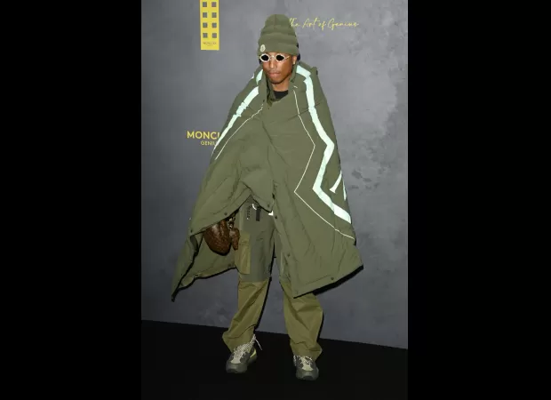 Pharrell Williams was seen wearing a sleeping bag-like outfit at a London Fashion Week event, shortly after being chosen to work with Louis Vuitton.