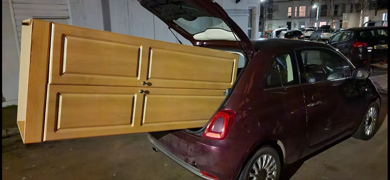 The driver believed that using his car to move his wardrobe would be a good idea.