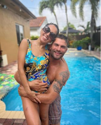 Janette Manrara showed her excitement by smiling broadly as she showed off her baby bump for the first time after announcing her pregnancy with Aljaž Škorjanec.