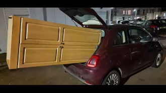 The driver believed that using his car to move his wardrobe would be a good idea.