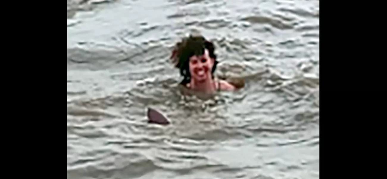 A British tourist was terrified that she would be killed when a dolphin almost severed her foot while she was swimming in open water.