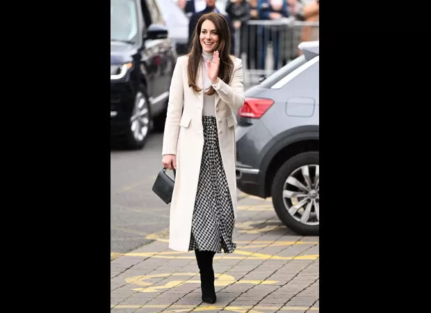 Kate Middleton looked great once more in her Zara houndstooth skirt and cream coat.