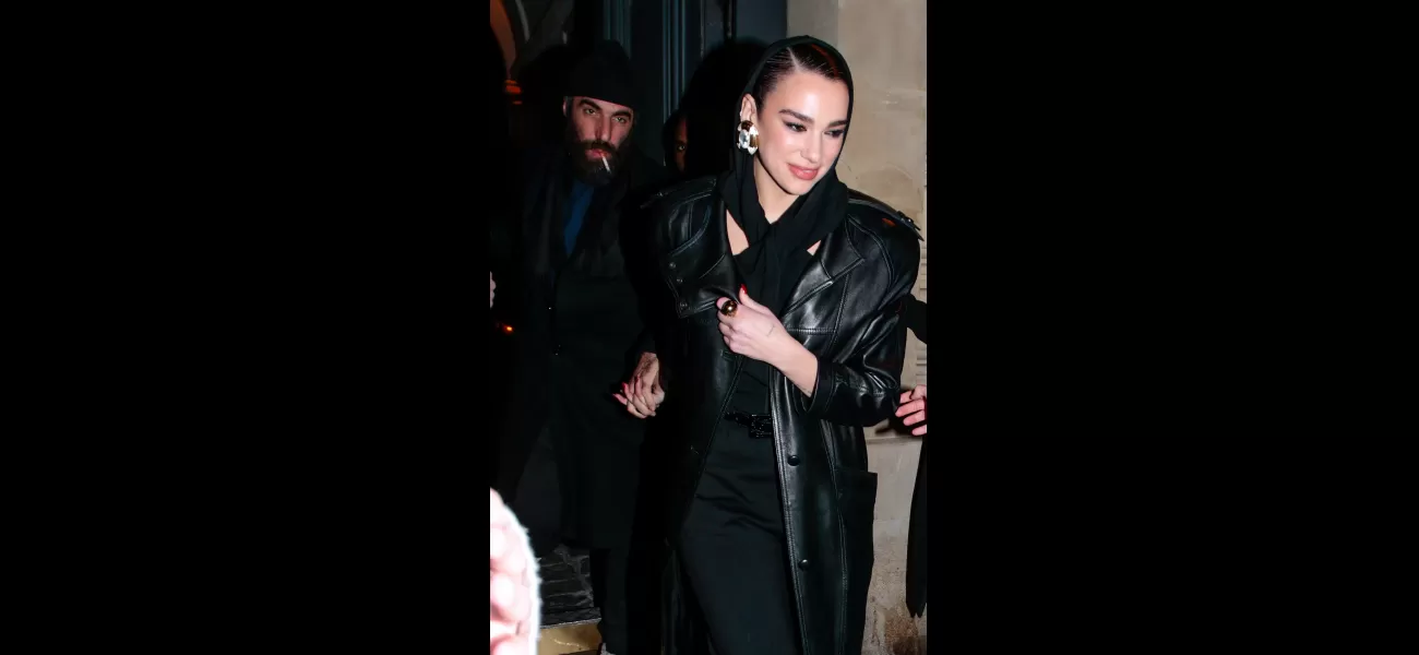 Dua Lipa and her boyfriend Romain Gavras were seen holding hands as they left the Saint Laurent fashion show in Paris.