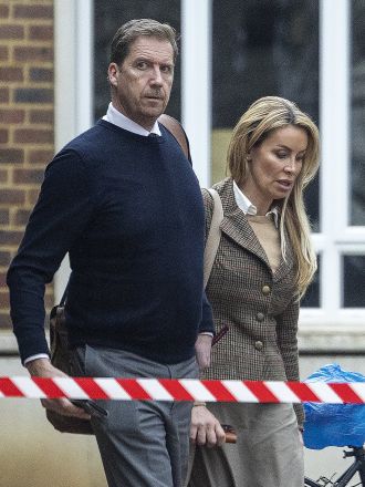 A former model was allegedly involved in helping to smuggle £5,000,000 of criminal money into Dubai in suitcases.