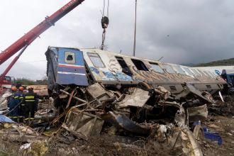 Rail workers in Greece went on strike in protest of a deadly train crash, and the Prime Minister promised that it would not happen again.