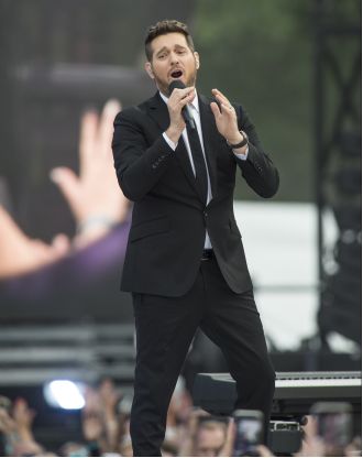 Michael Buble is looking for the person who gave fans bad tattoos, in order to make it right.
