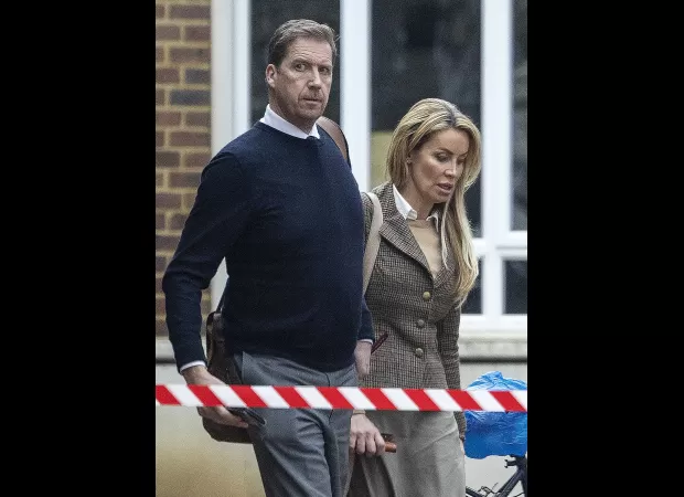 A former model was allegedly involved in helping to smuggle £5,000,000 of criminal money into Dubai in suitcases.