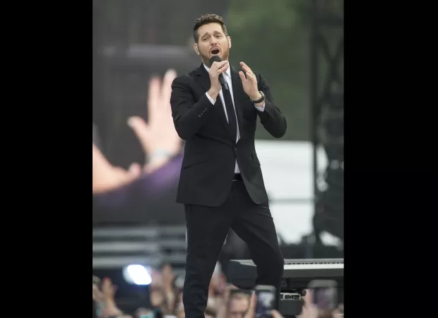 Michael Buble is looking for the person who gave fans bad tattoos, in order to make it right.