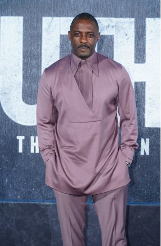 Idris Elba responds to speculation that he will be the next James Bond, seemingly confirming it with a subtle reference in his new Luther movie.