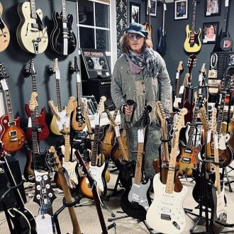 Johnny Depp touched down at an antiques centre by helicopter before picking out some unusual items for his London residence.