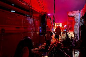 18 people have died in an oil depot fire in Indonesia, including two children.