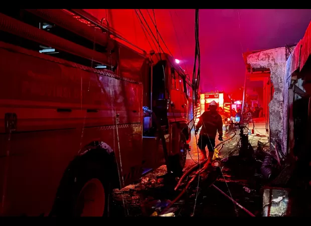 18 people have died in an oil depot fire in Indonesia, including two children.