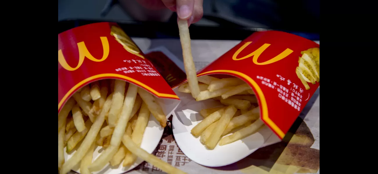 The person considers which size of McDonald's French fries would be the best to purchase.