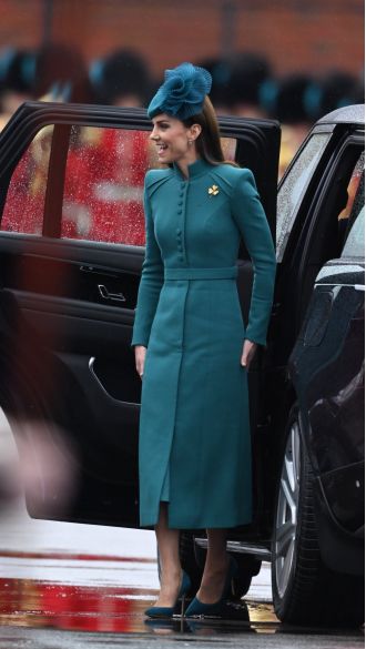 At the St Patrick's Day parade, Kate Middleton and Prince William made a stylish appearance, with Kate wearing a stunning turquoise coat from Catherine Walker.