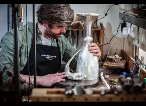 This is the tale of a family heirloom, a cup passed down through the generations of the Cuttitta family. It's a cherished symbol of their shared history and a reminder of their Italian heritage.