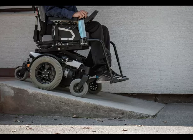 A dad in a wheelchair is unable to leave his home due to the local council not constructing a ramp to provide him access.