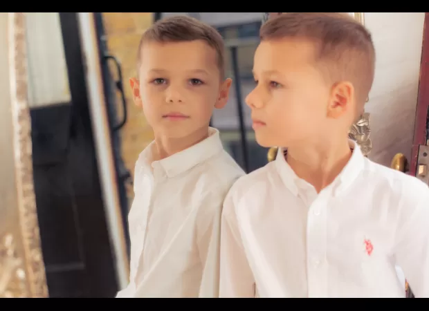 Two boys, aged 7 and 9, were found dead at home along with their mum; they were reportedly strangled.