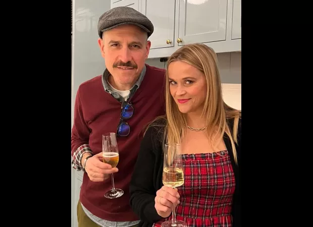 Reese's divorce sparked by Jim's midlife crisis.