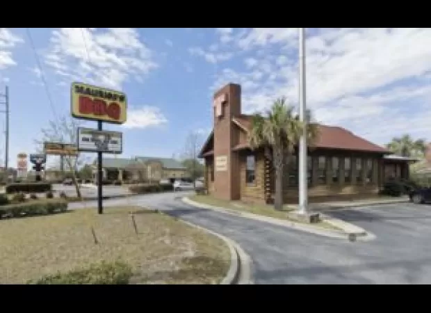 Woman sues BBQ chain for racism, citing SC law. Chain is known for discriminatory practices.