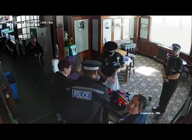 Landlord ignores police advice and displays golliwog dolls again in her bar.