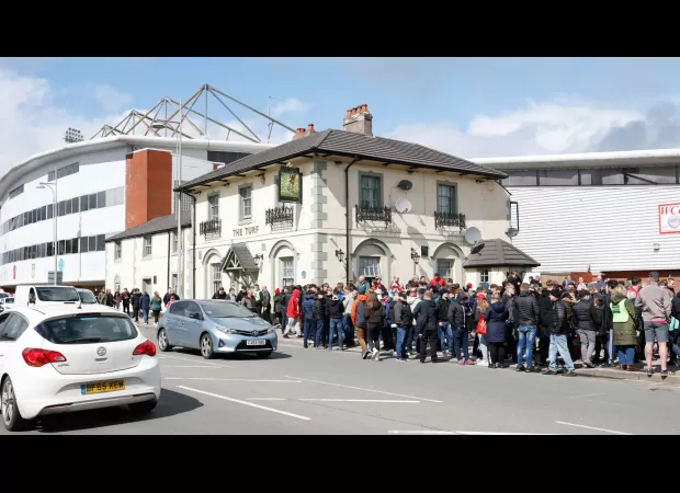 Ryan Reynolds joins group in pub for a celebratory singalong after Wrexham's huge win.