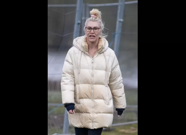 Jo O'Meara appears somber in her first outing since the death of her S Club 7 bandmate Paul Cattermole.