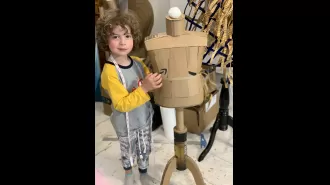 A 7-year-old is designing dresses for stars, becoming a fashionista at a young age.