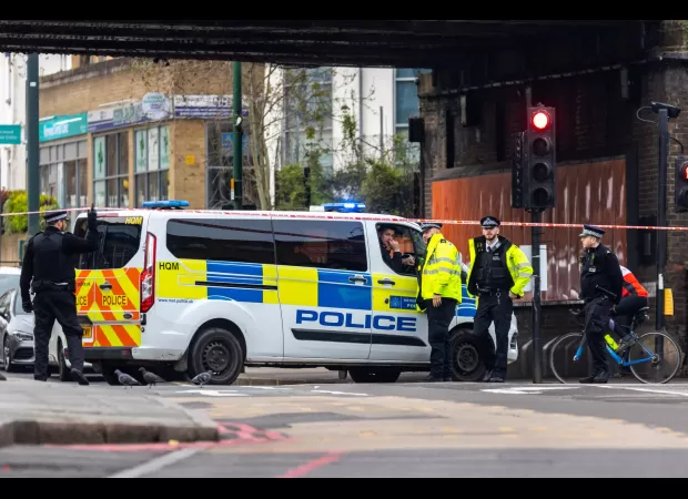20-year-old man fatally collapses in store after stabbing near train station.