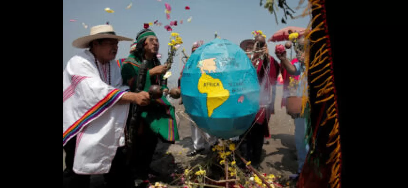 Activists come together to mark Earth Day, calling for urgent action to prevent a 
