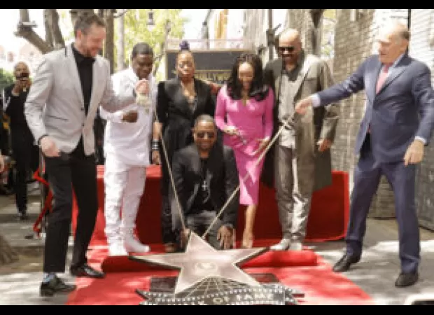 Martin Lawrence celebrated his Hollywood Walk of Fame star surrounded by friends Steve Harvey and Tracy Morgan, who praised him for his success.