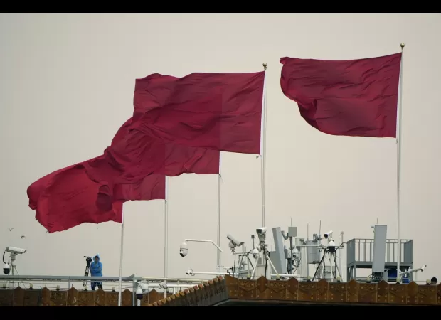 China passes new law to expand scope of its counter-espionage activities, including raids on foreign companies.