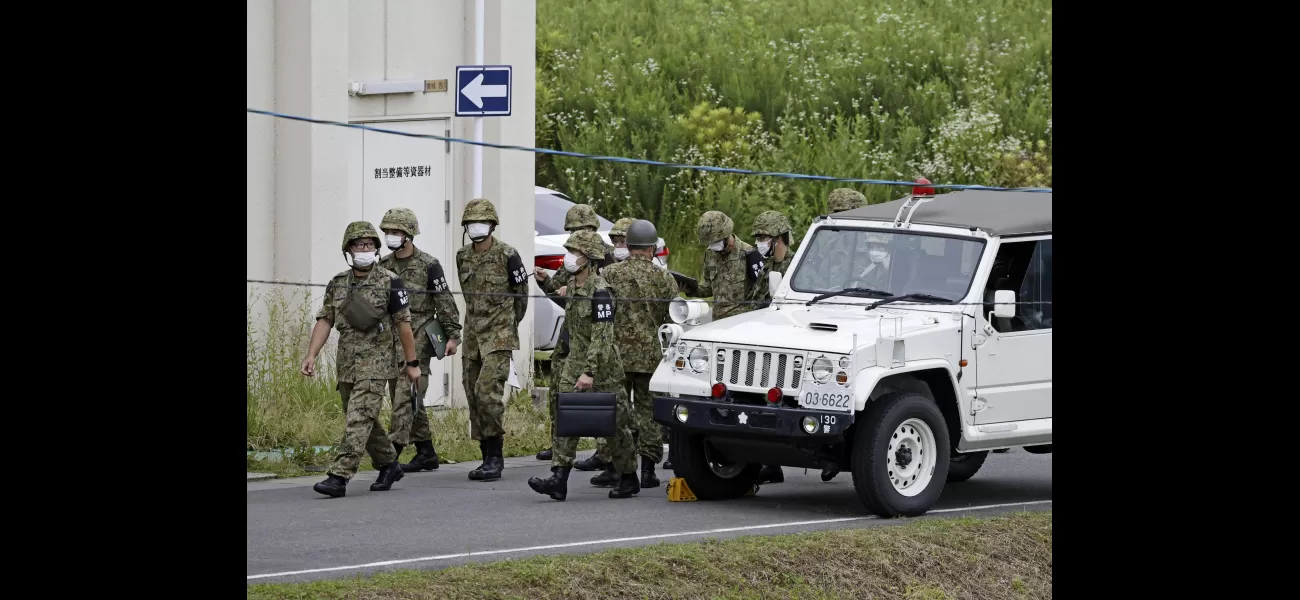 Two people killed when a Japanese cadet opened fire on fellow cadets, according to military.