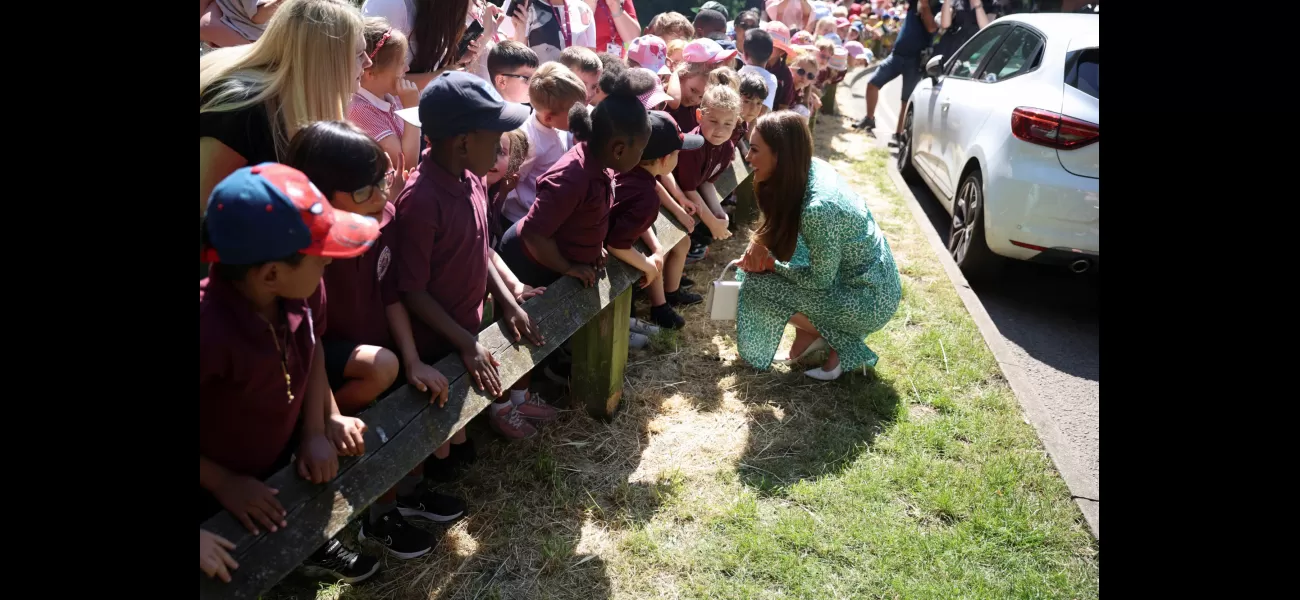 Kate Middleton wears summery leopard-print midi dress for visit to Nuneaton children's centre.