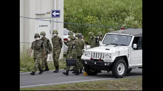 Two people killed when a Japanese cadet opened fire on fellow cadets, according to military.