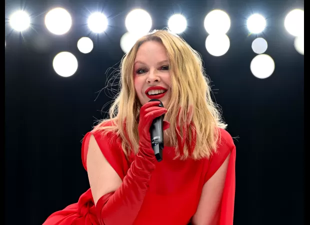 Kylie Minogue's Padam era brings happiness as she's named a major festival headliner.