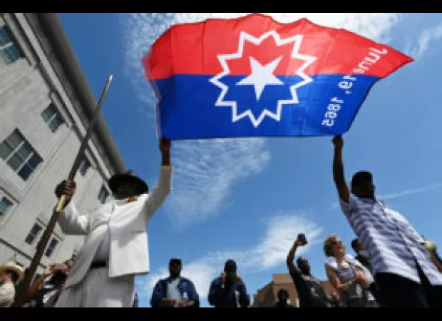 Cartoonist M. Rasheed sparks debate with their Juneteenth cartoon.