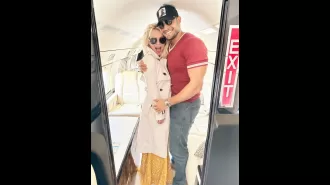 Britney and Sam cuddle as she requests a drink on a private jet.