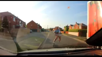 Driver nearly hit child on scooter in the street.