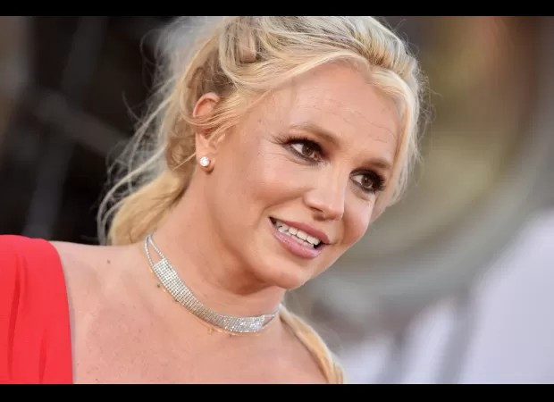 Britney Spears hints she might be performing at Glastonbury with a sly McDonald's reference.