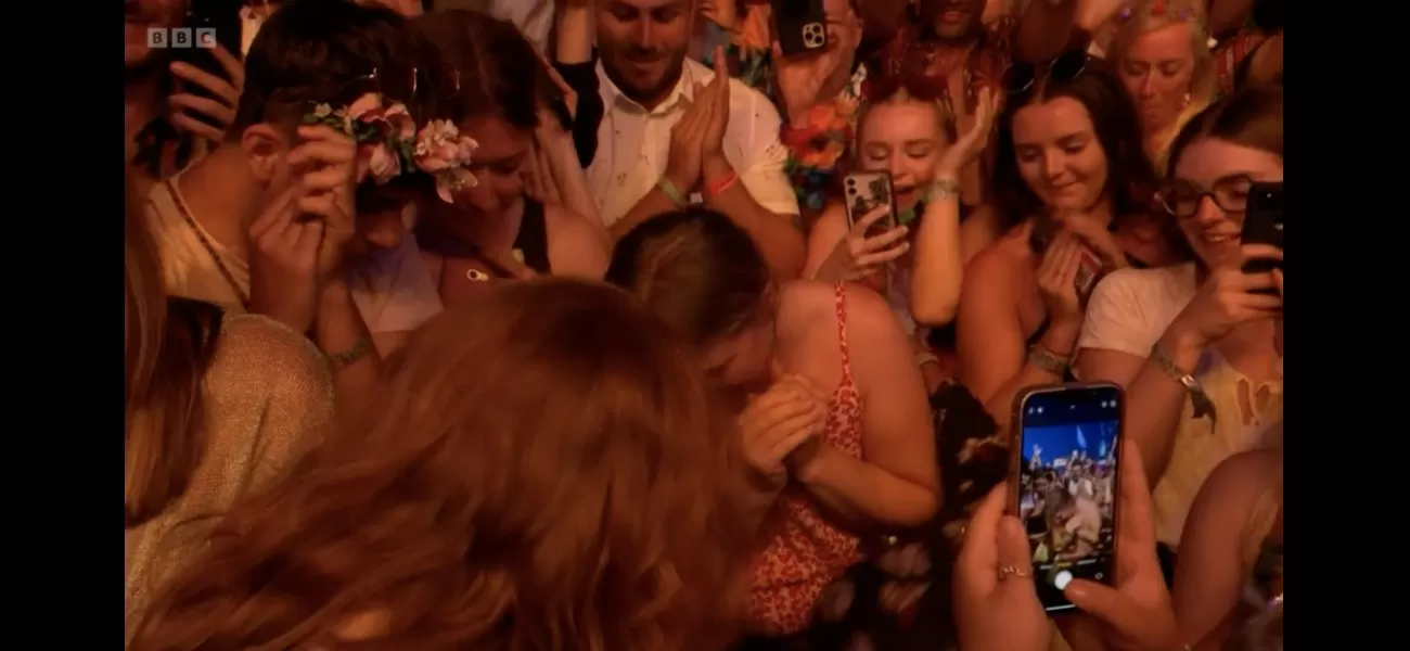 BBC cameras record a romantic proposal during Sir Elton John’s duet with Brandon Flowers, thrilling viewers.