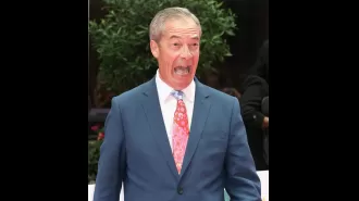 Nigel Farage met with jeers as he accepted an award for news presenter of the year.
