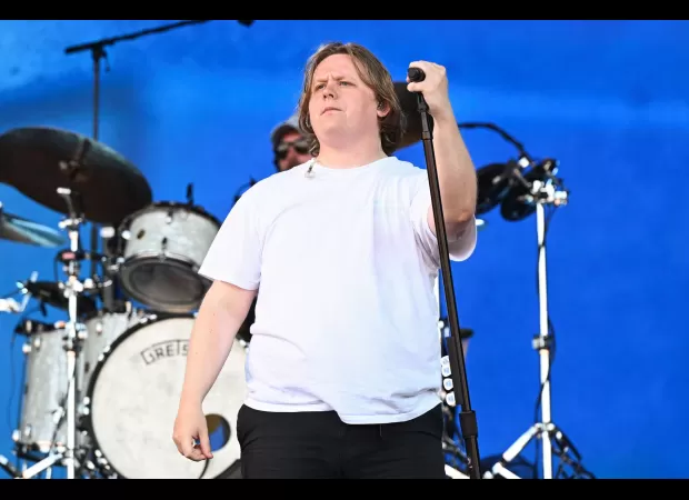 Lewis relying on partner Ellie for support after having to cancel his tour due to heartbreak.