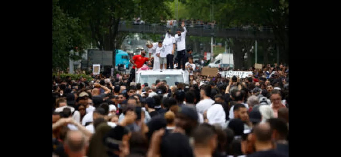 Protests in France continue for third day after police shooting of African teen, thousands gather at vigil.