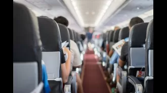 Woman horrifies fellow passengers by brushing her teeth and spitting into a dirty cup on a flight.