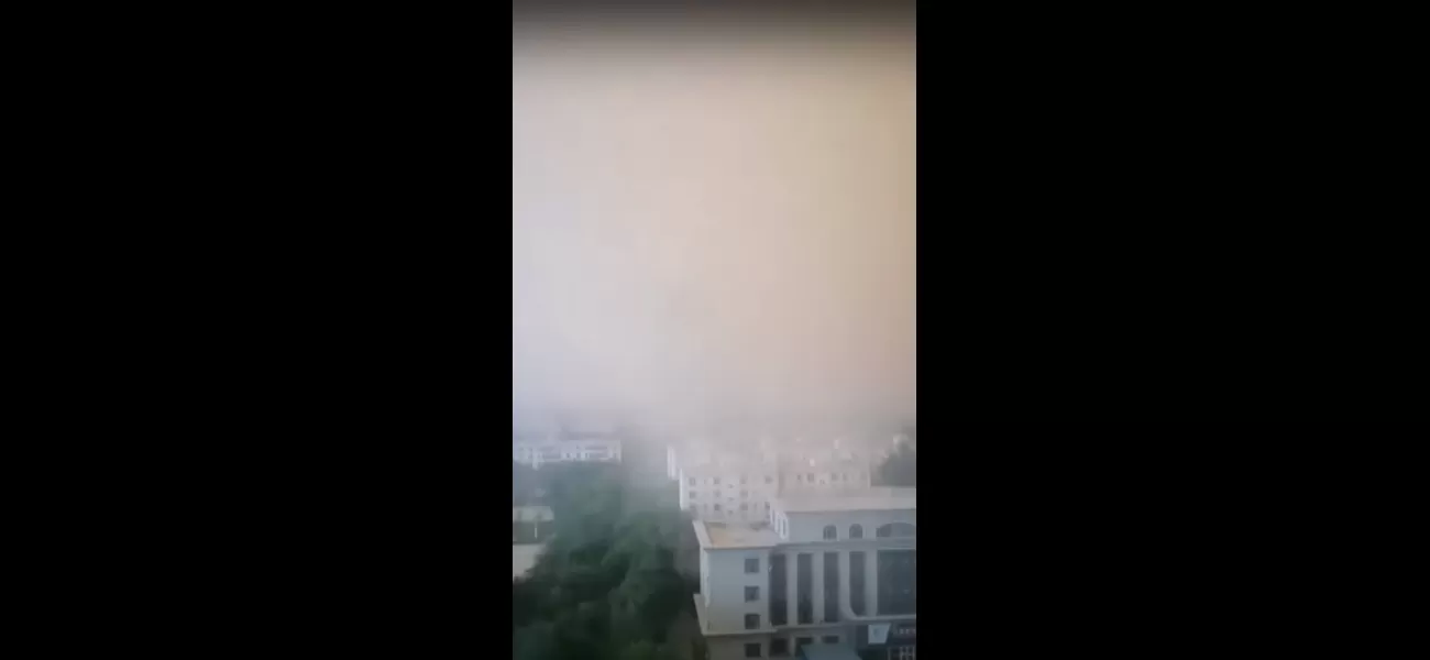 A city is consumed by a sandstorm with towering dust clouds reaching 300ft.