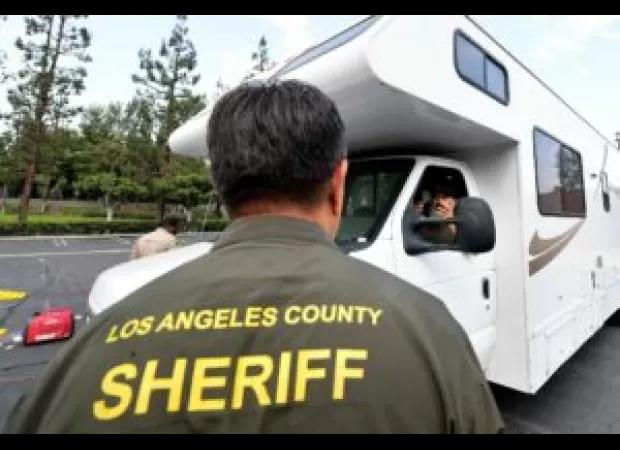 Deputy in LA seen dragging Black woman to ground in video that has gone viral.