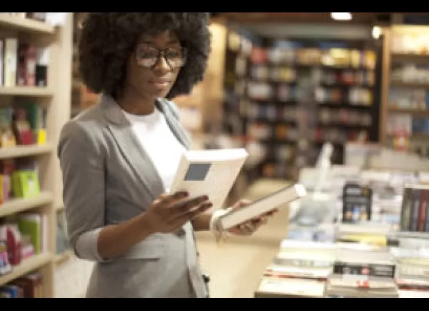 Essence and New Orleans bookstore settle legal dispute over ordinance on retailers in the area.